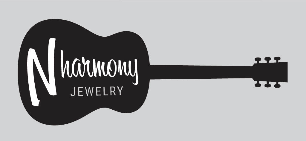 N Harmony Jewelry handmade guitar string bracelets, earrings, and necklaces displayed with music inspired styling