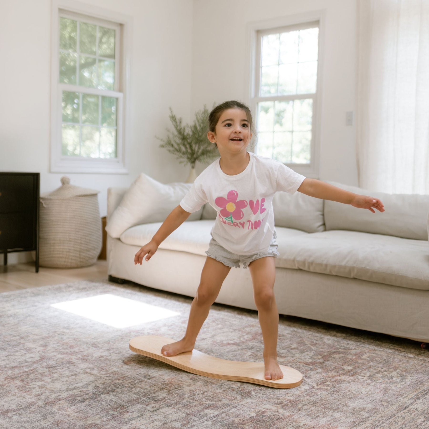Spinzee Board by Bunny Hopkins, handcrafted wooden activity toy product and lifestyle photo 11