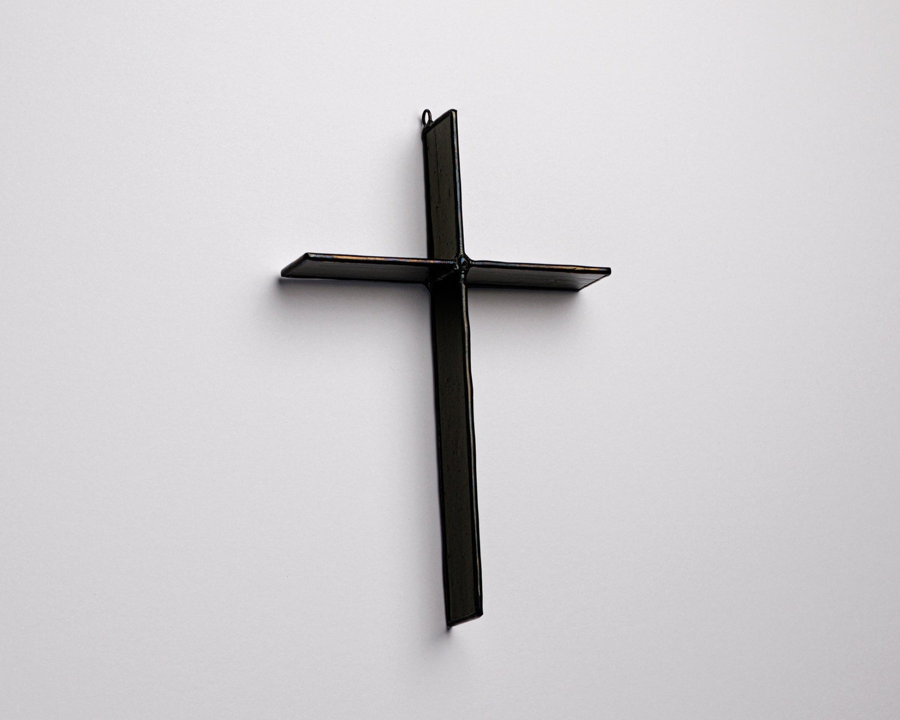 Ink Black Cross Suncatcher handmade stained glass cross by Greyhouse Glass