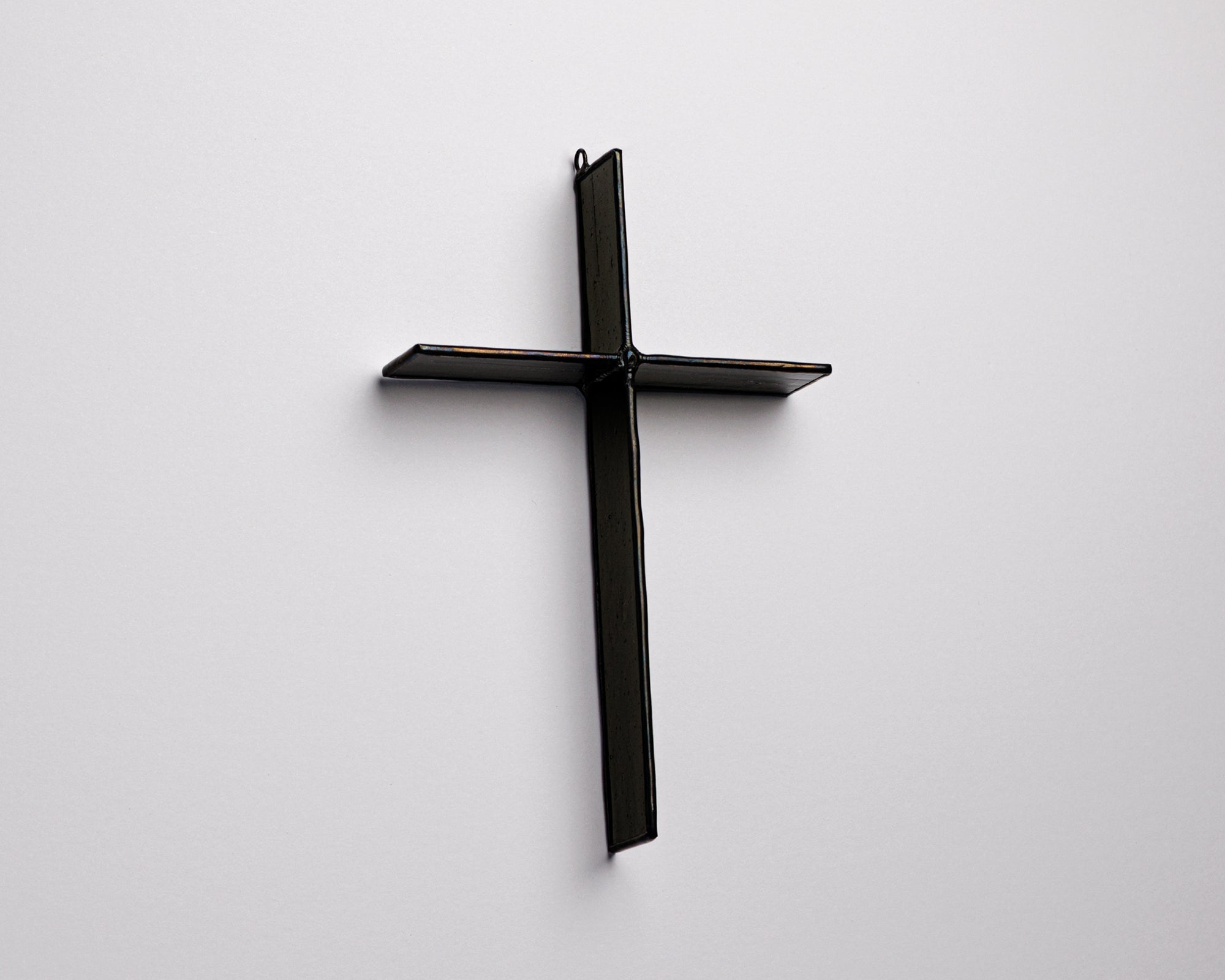 Ink Black Cross Suncatcher handmade stained glass cross by Greyhouse Glass