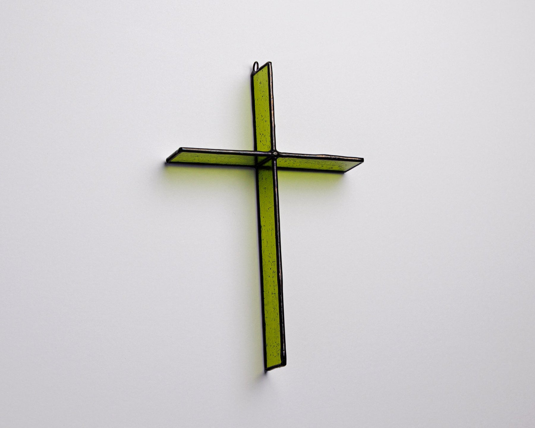 Bottle Green Cross Suncatcher handmade stained glass cross by Greyhouse Glass