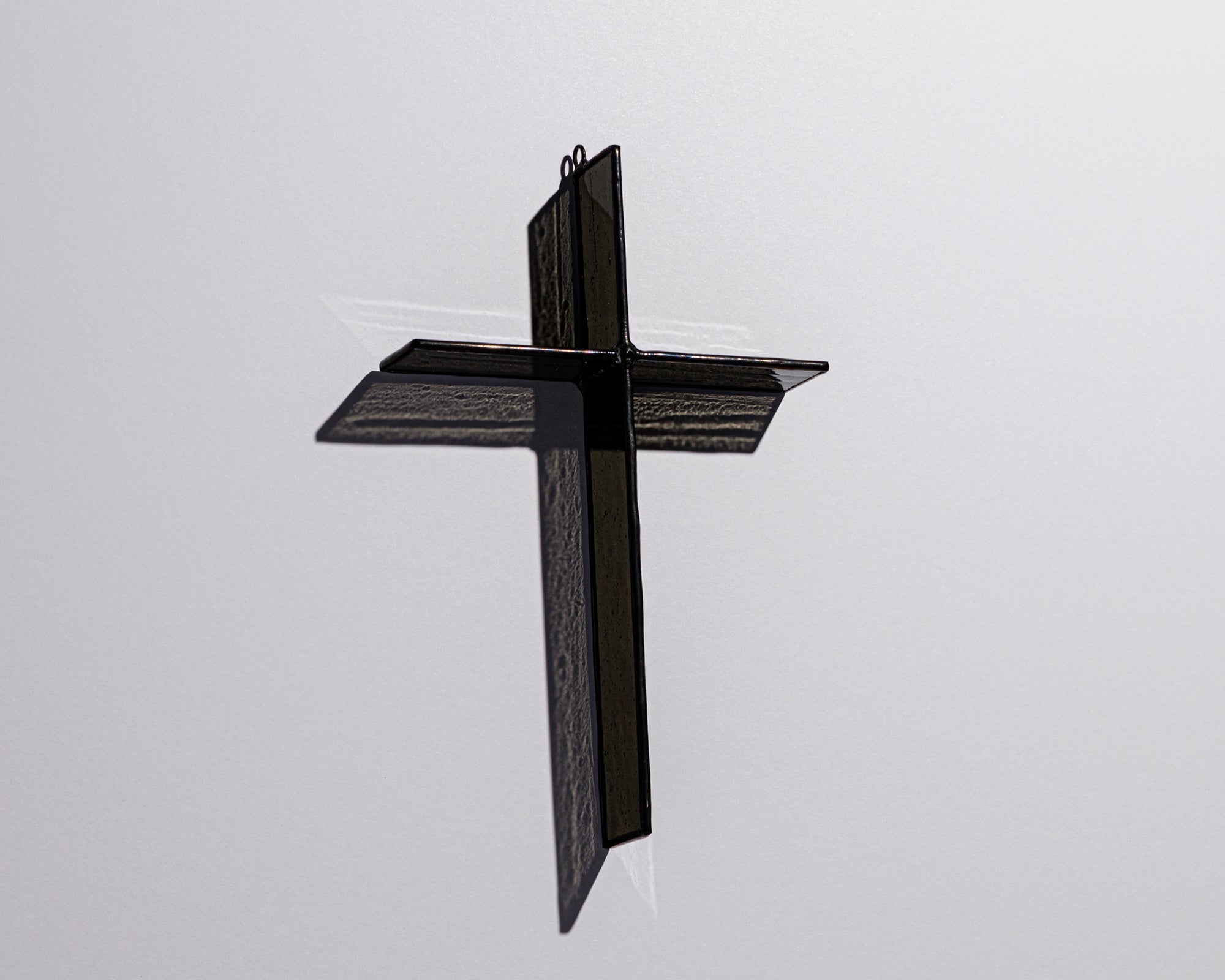 Alternate view of Ink Black Cross Suncatcher with real stained glass and black patina