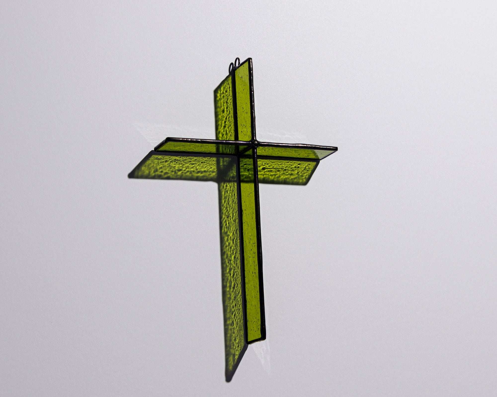 Alternate view of Bottle Green Cross Suncatcher with real stained glass and black patina