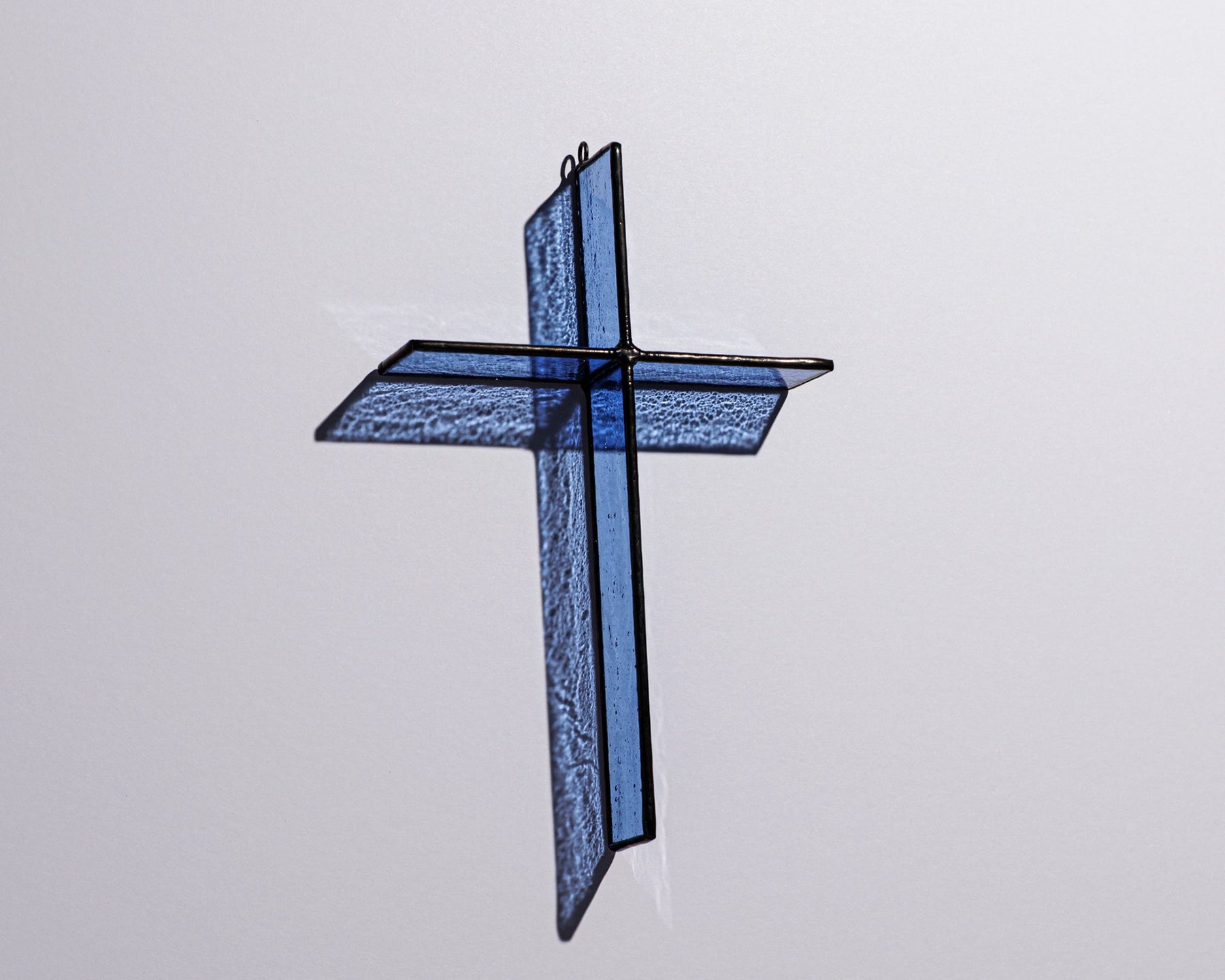 Alternate view of Harbor Blue Cross Suncatcher with real stained glass and black patina