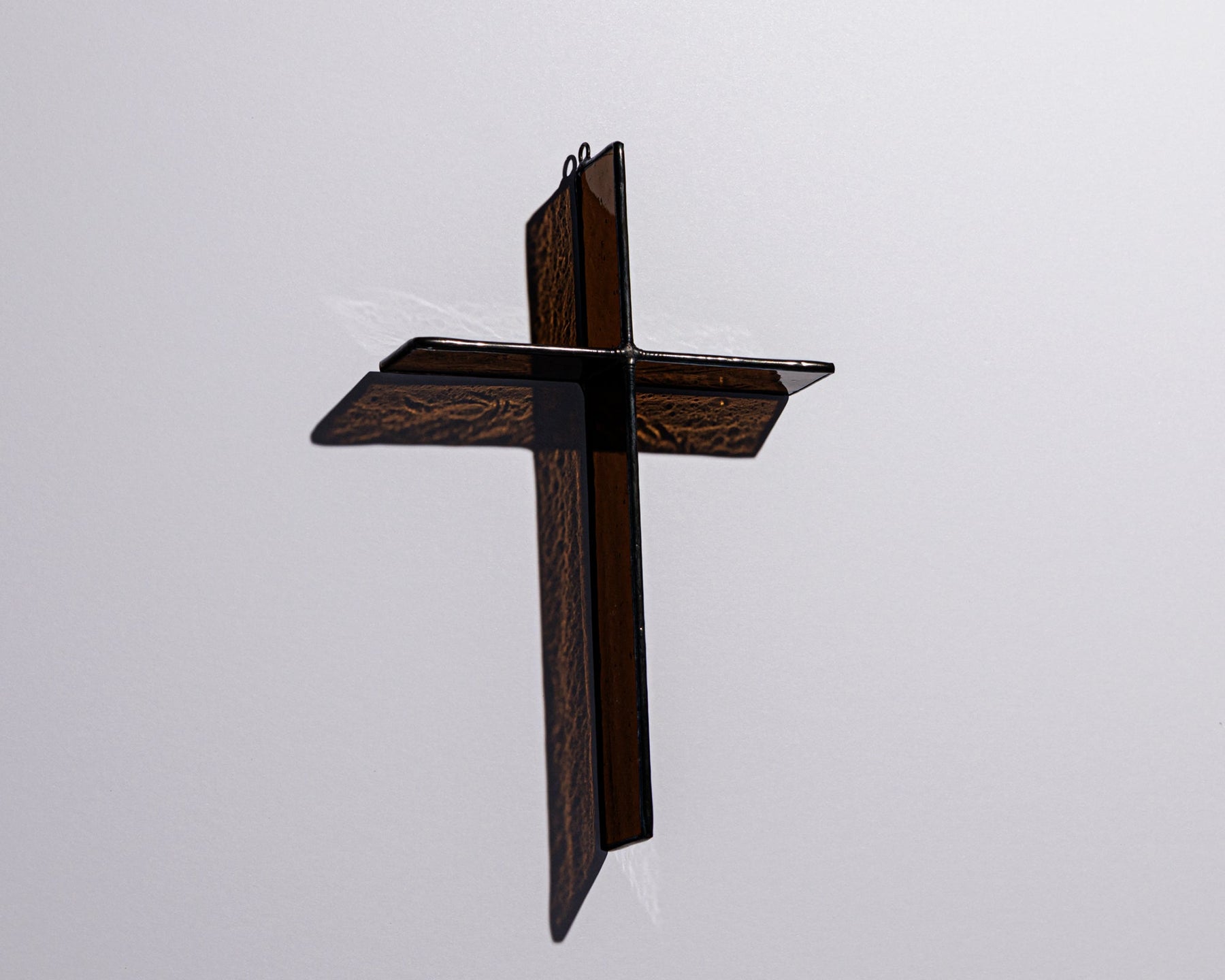 Alternate view of Mocha Brown Cross Suncatcher with real stained glass and black patina