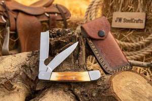 Razor Trapper Knife with Burned Bone Handle and Steel Bolsters by JW SteelCrafts