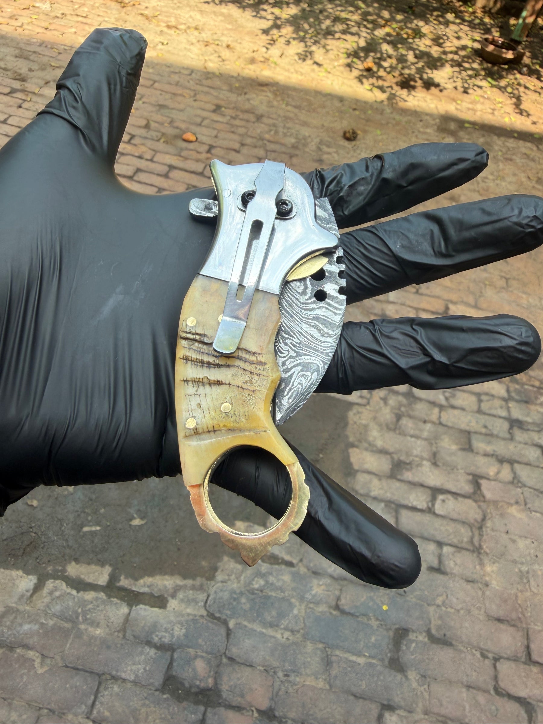 Wolf Claw Damascus Folding Karambit with Engraved Wolf Bolster&nbsp;