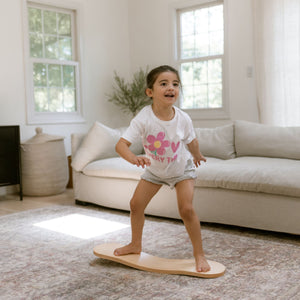 Spinzee Board by Bunny Hopkins, handcrafted wooden activity toy product and lifestyle photo 12