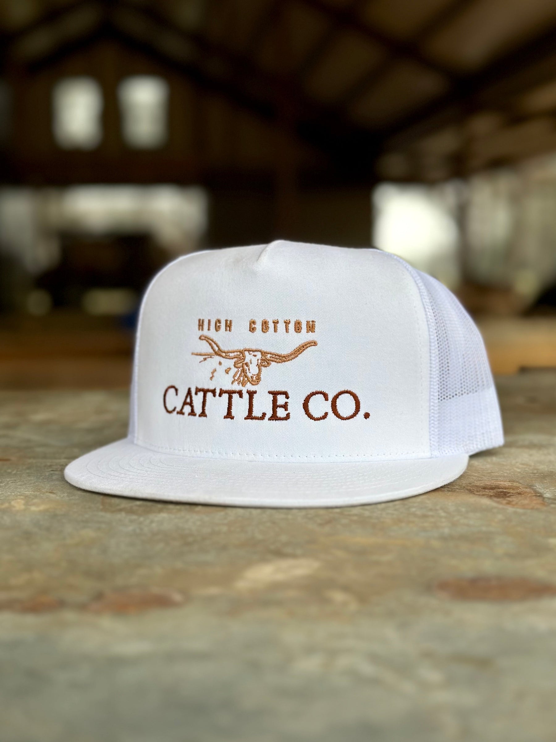 The Cattleman White Flat Bill Hat by High Cotton Hat Co in Texas