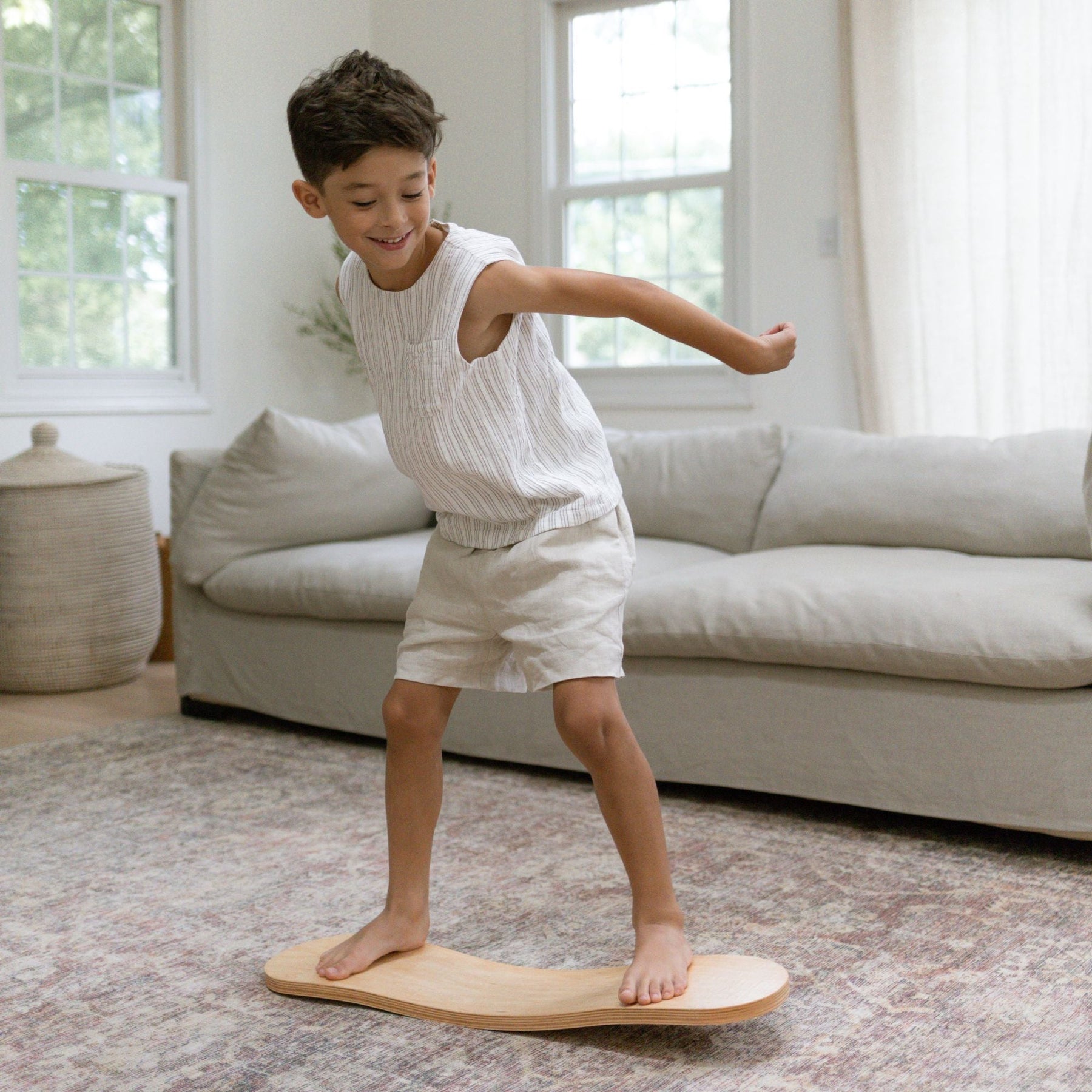 Spinzee Board by Bunny Hopkins, handcrafted wooden activity toy product and lifestyle photo 14