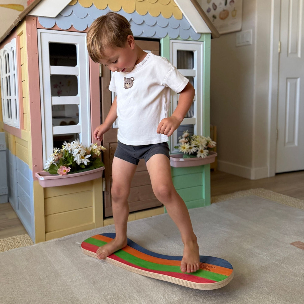 Spinzee Board by Bunny Hopkins, handcrafted wooden activity toy product and lifestyle photo 4