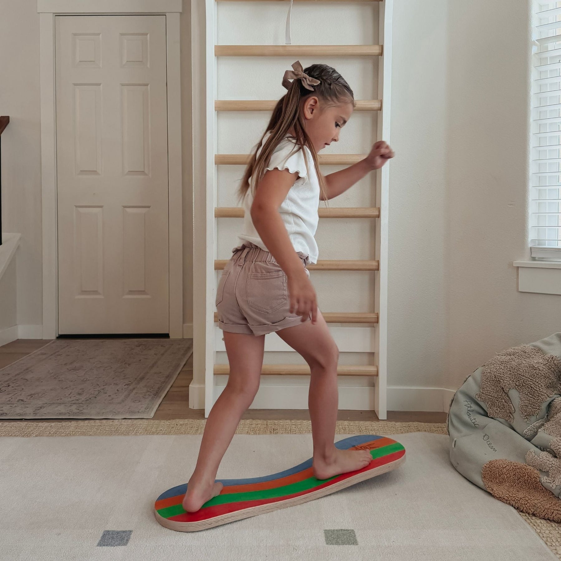 Spinzee Board by Bunny Hopkins, handcrafted wooden activity toy product and lifestyle photo 6