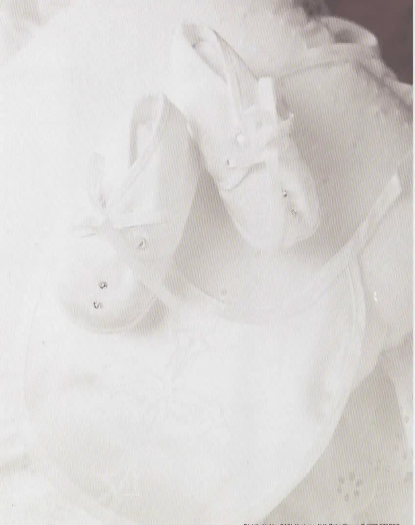 Personalized Baby Name Gift: White baby shoes and undershirt. Custom first name meaning keepsake by A & H Creative Names.