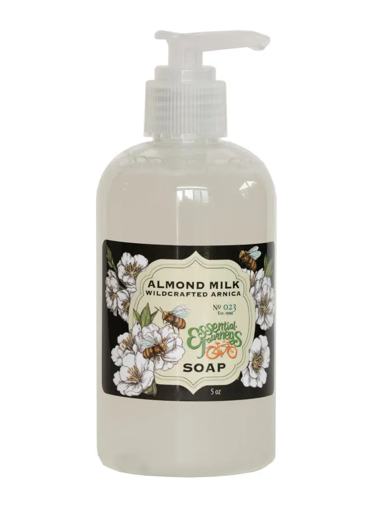 Essential Journeys Almond Milk Wildcrafted Arnica liquid soap bottle with bee and floral label