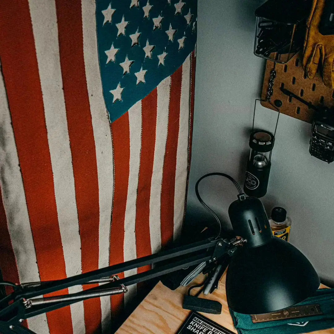 American flag made from recycled fire hose with arid border detail.