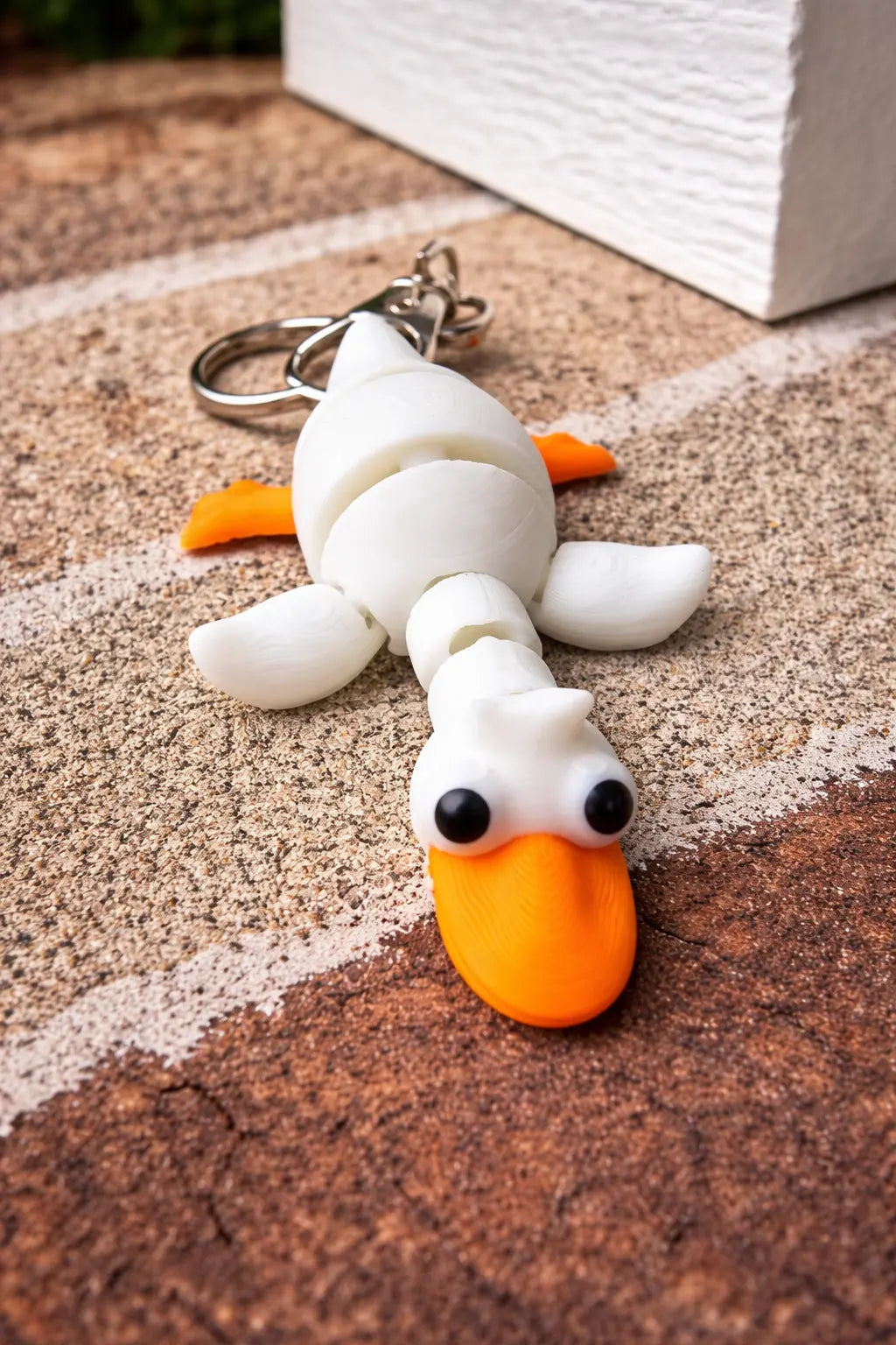 The Tween Space Articulated Duck Fidget Keychain wholesale bulk sensory toy