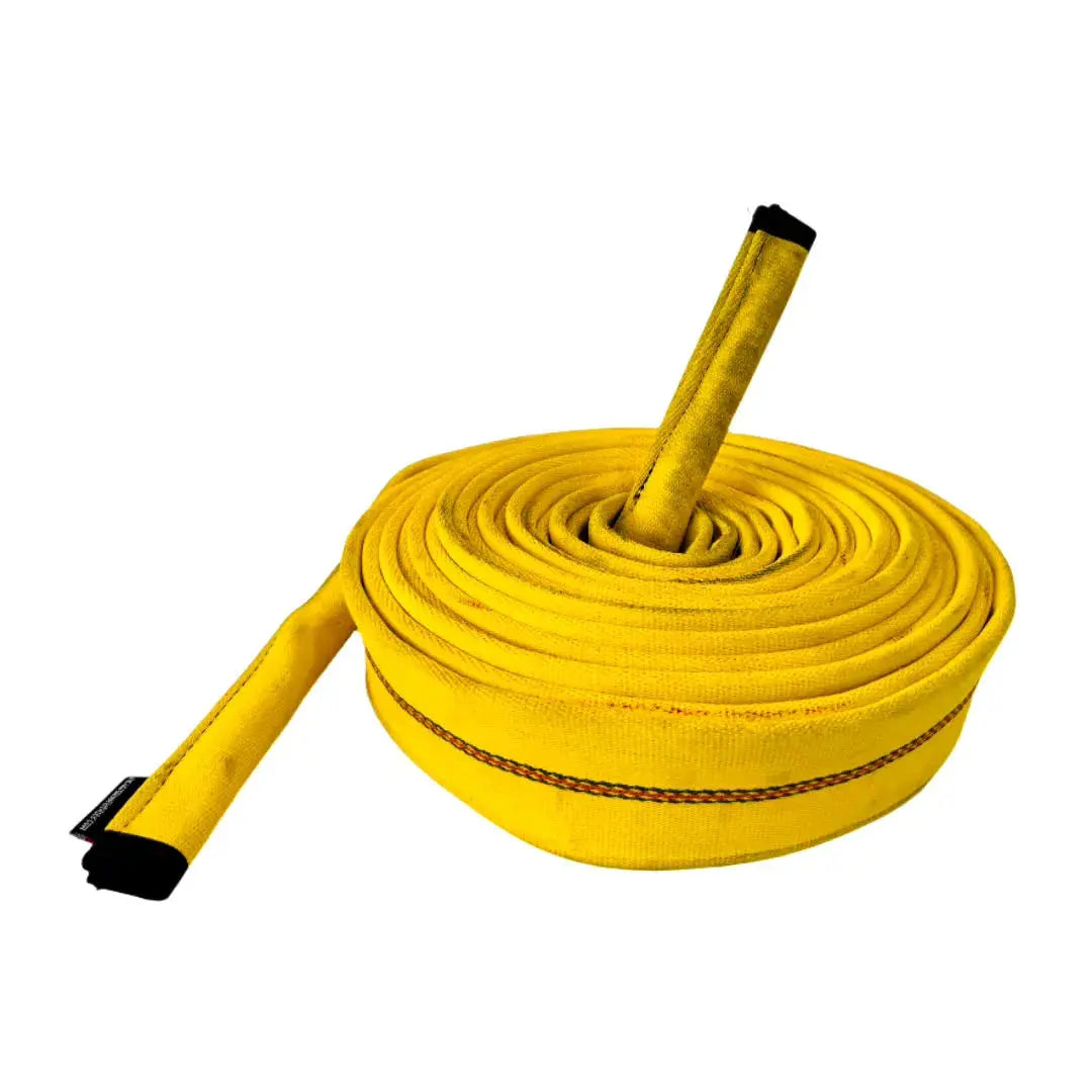 Coiled yellow battle rope made from recycled fire hose material.