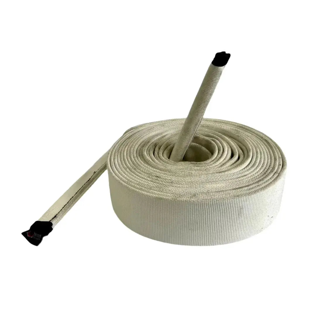 Rolled up cream-colored battle rope made from recycled fire hose material.