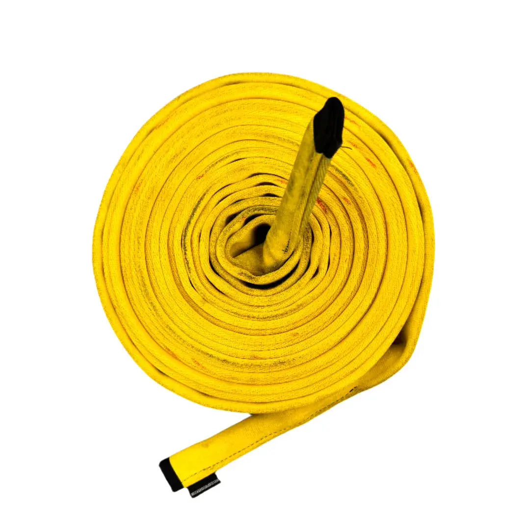 Yellow coiled rope with black ends, likely a battle rope made from recycled firehose material.