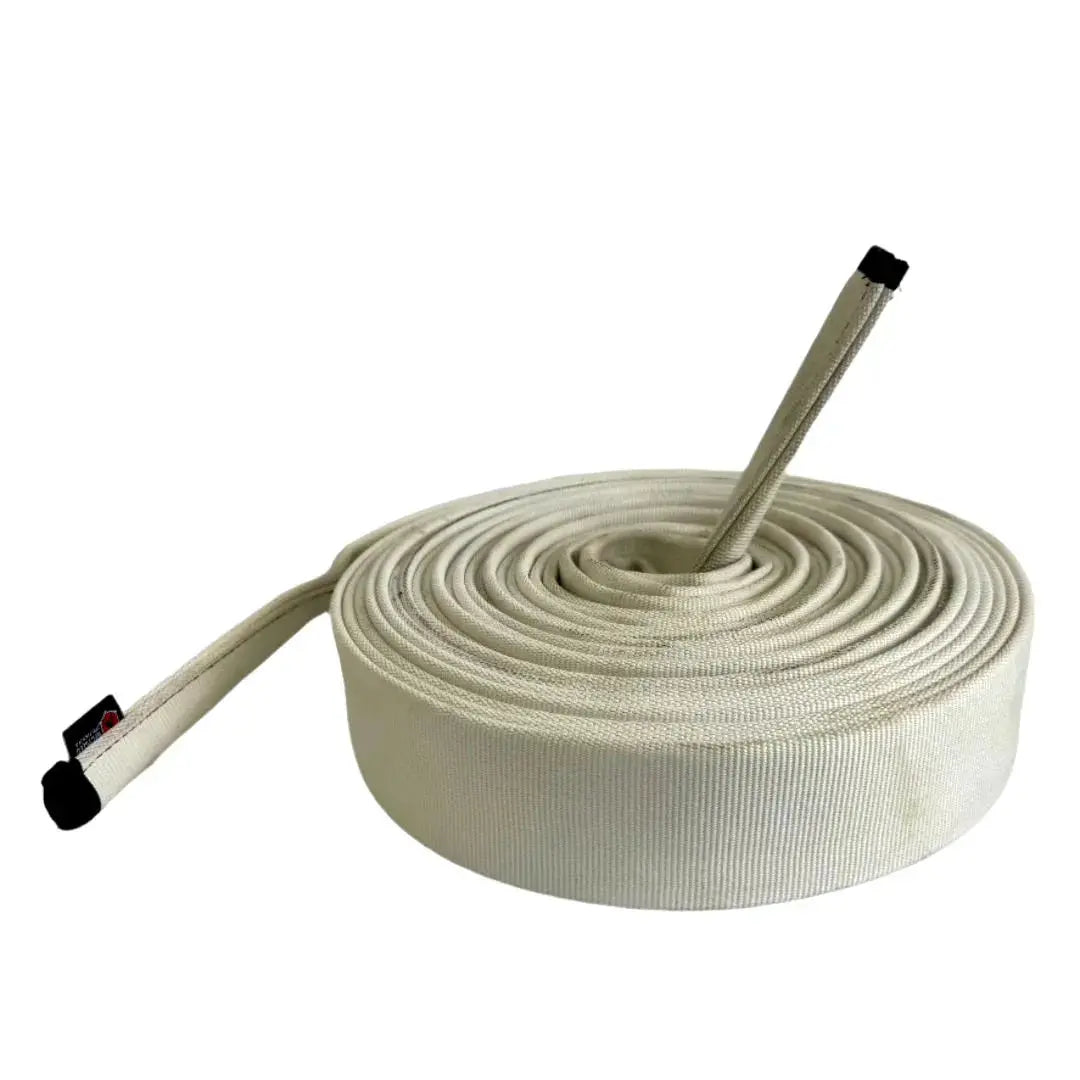 Rolled beige fire hose battle rope with black ends on white background.
