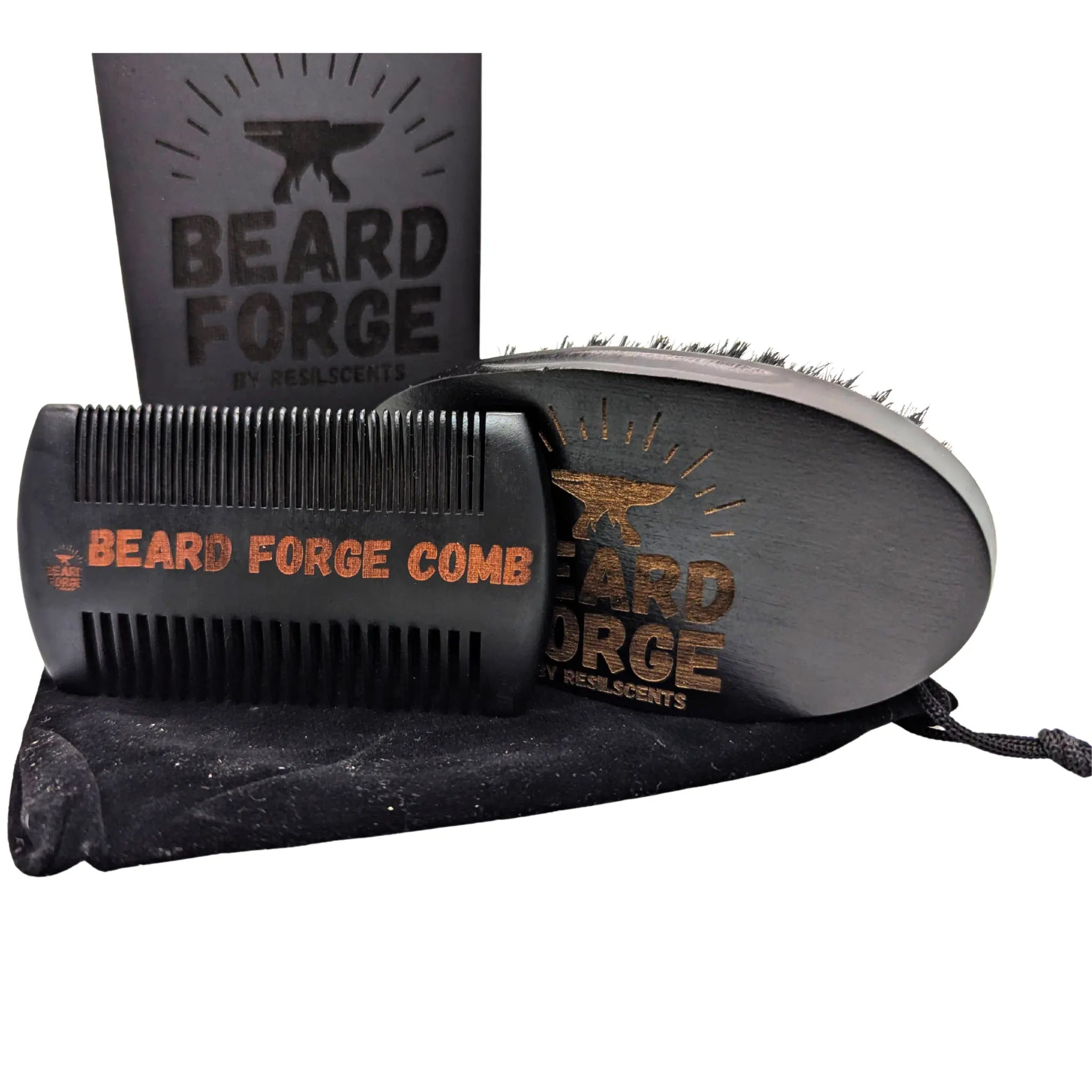 Beard Forge grooming kit with brush, comb, velvet bag, and box; visible brand name, and wood grain.