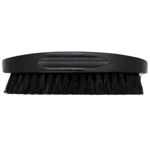 Black beard brush with bristles and wooden handle for grooming.