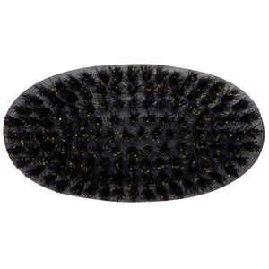 Oval beard brush with black bristles and yellow tips for grooming, top-down view.