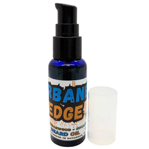 Bottle of Urban Edge beard oil with black pump and clear cap on a white background.
