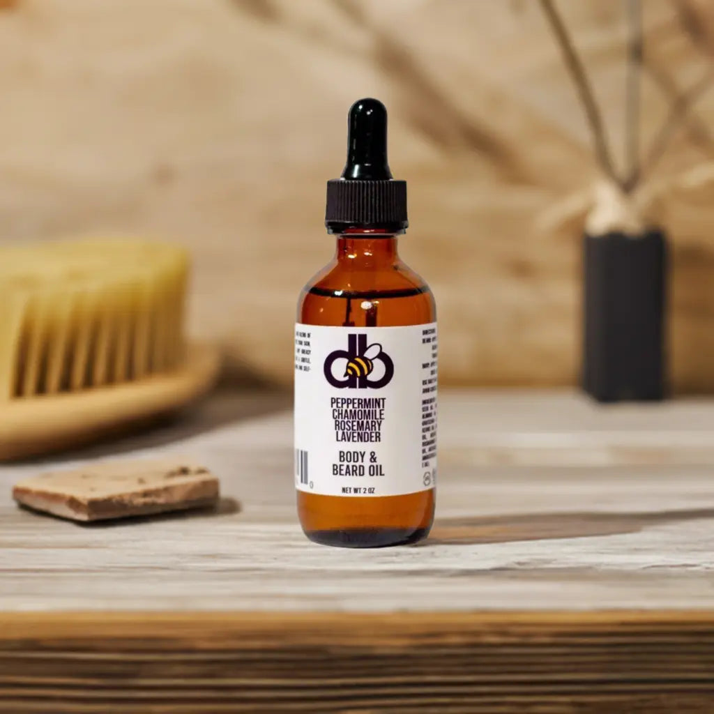Body & Beard Oil in amber bottle with dropper. Peppermint, chamomile, rosemary, and lavender scent.