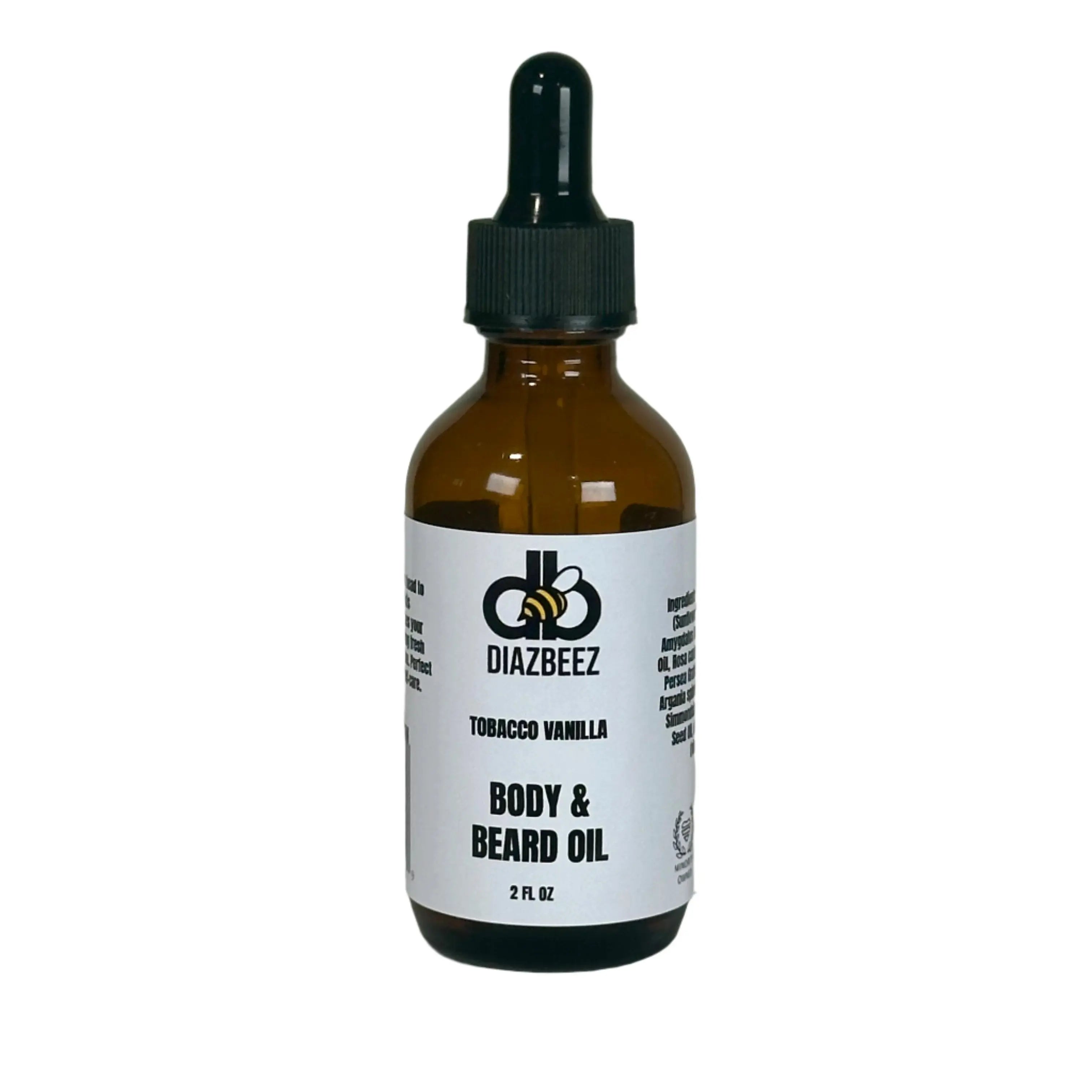 Amber glass bottle of Diazbeez tobacco vanilla body and beard oil with dropper top and white label.