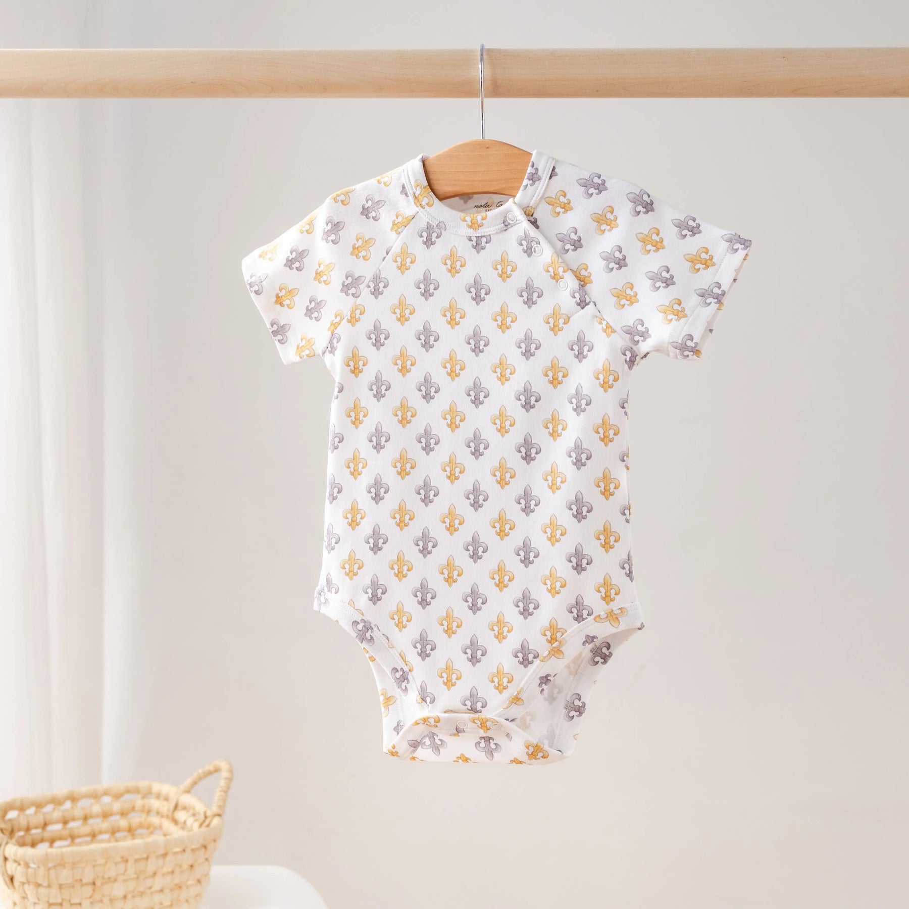 Black and Gold Fleur de Lis Organic Cotton Onesie by Nola Tawk, Southern lifestyle apparel main product photo