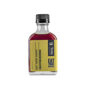 Bourbon Barrel Aged Madagascar Vanilla Extract in glass bottle with yellow label