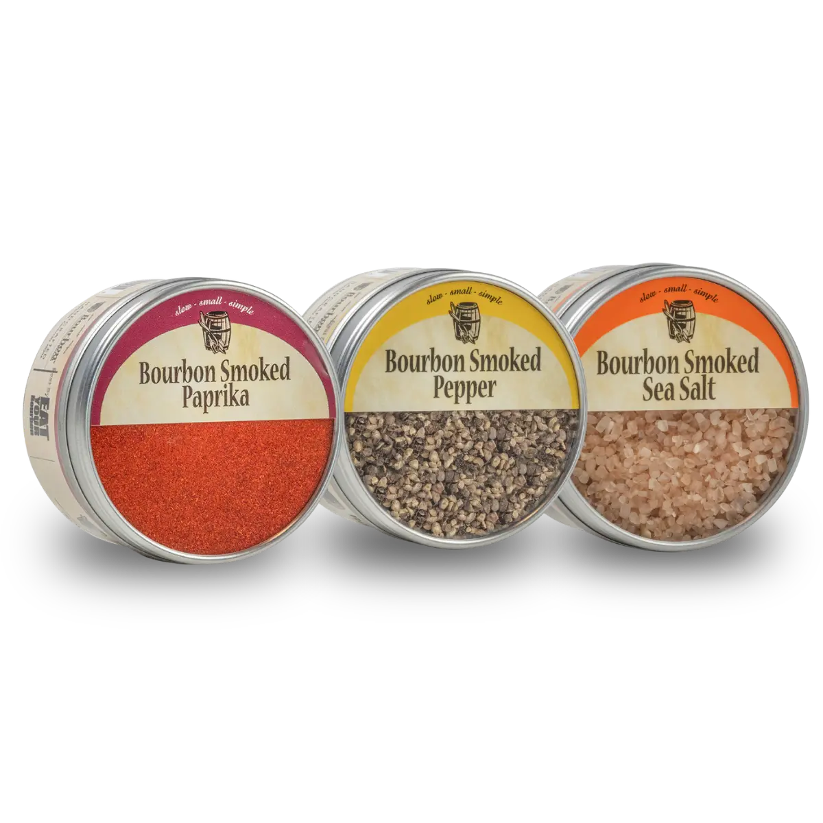 Three tins of bourbon smoked spices: paprika, pepper, and sea salt.