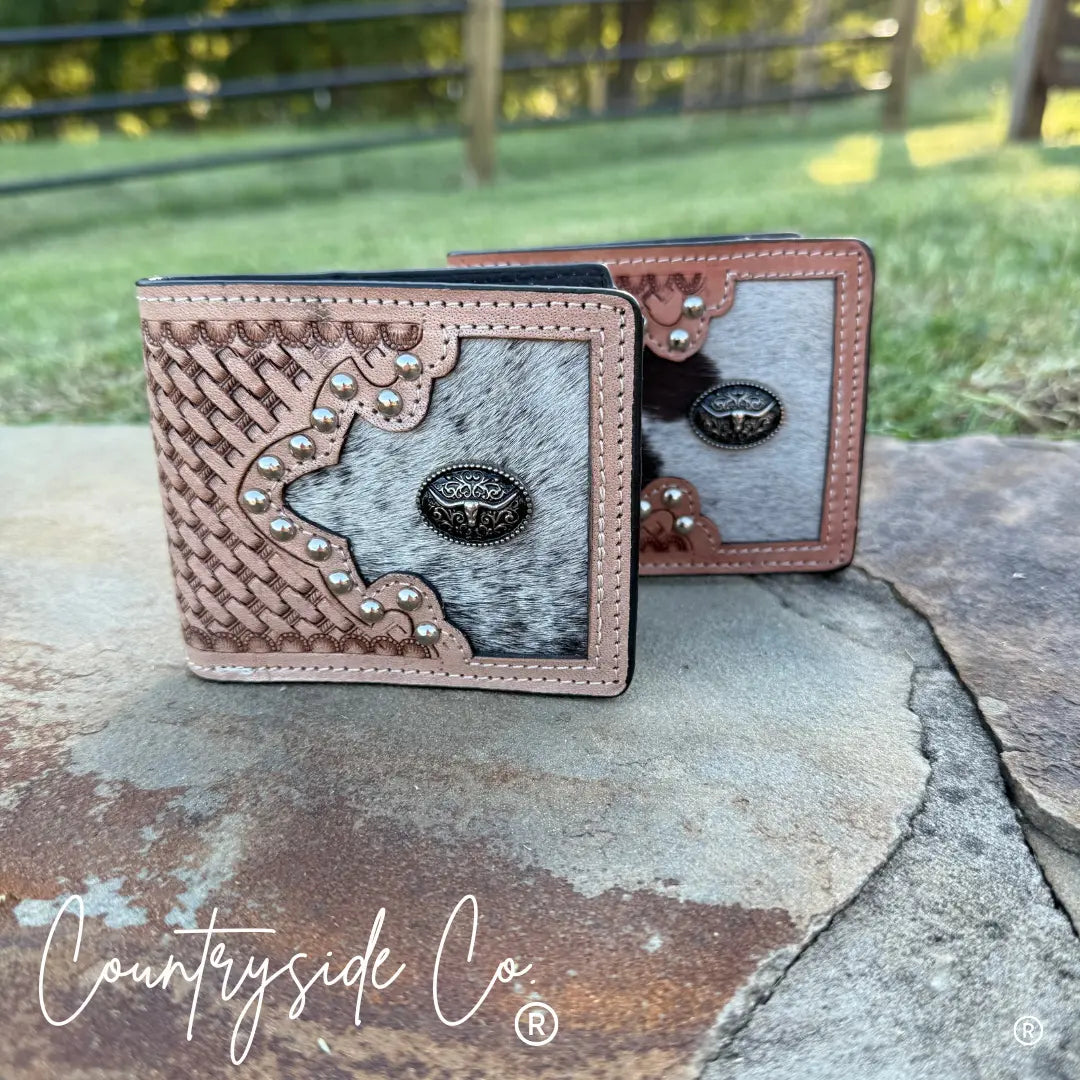 Men's tooled leather and cowhide wallet with longhorn medallion.