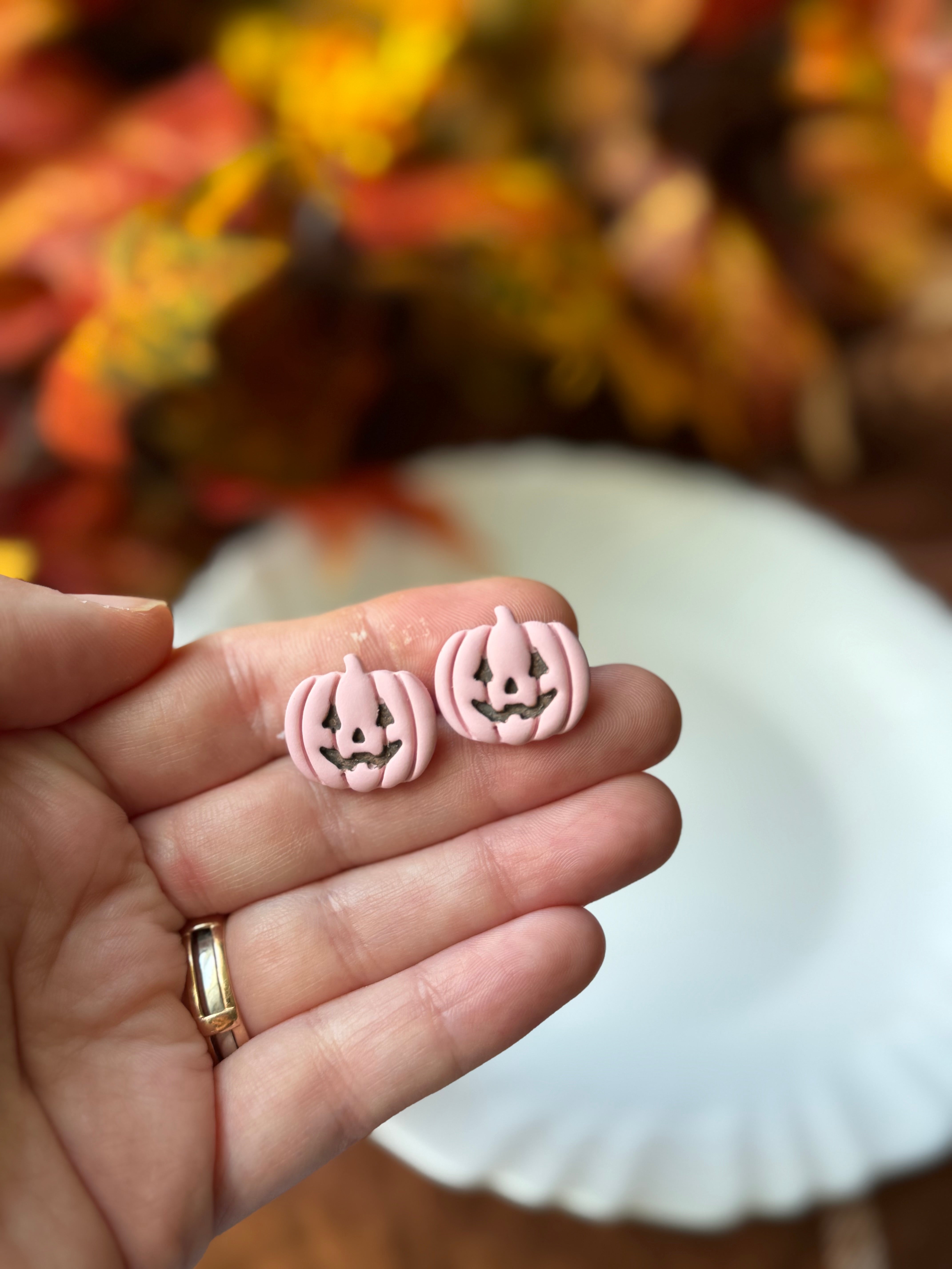 Pink Jack-O-Lantern Studs handmade polymer clay earrings by Shop Something Earthy — view 1 of 2