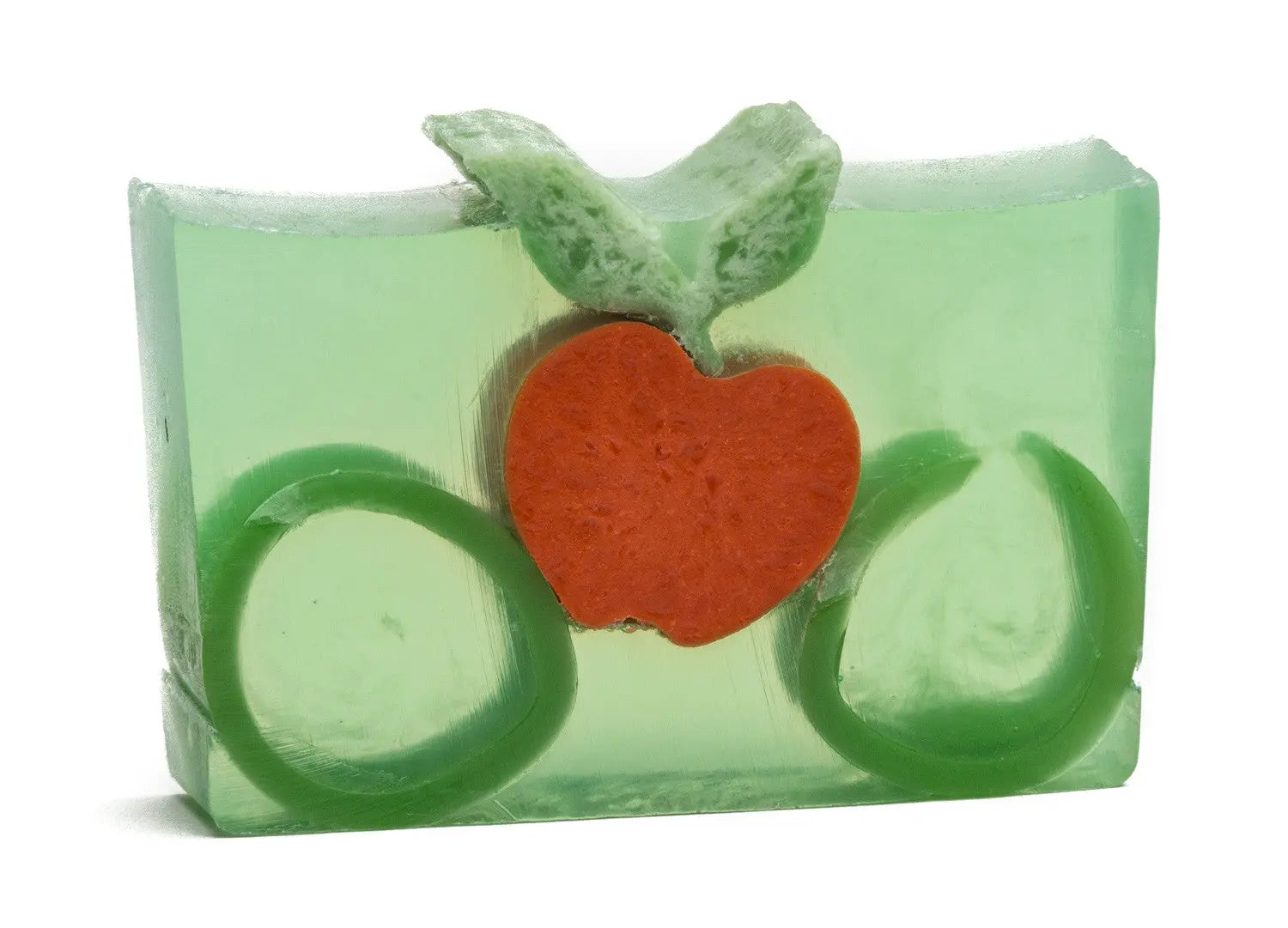 Green translucent soap bar with embedded orange apple shape and green leaf accents.