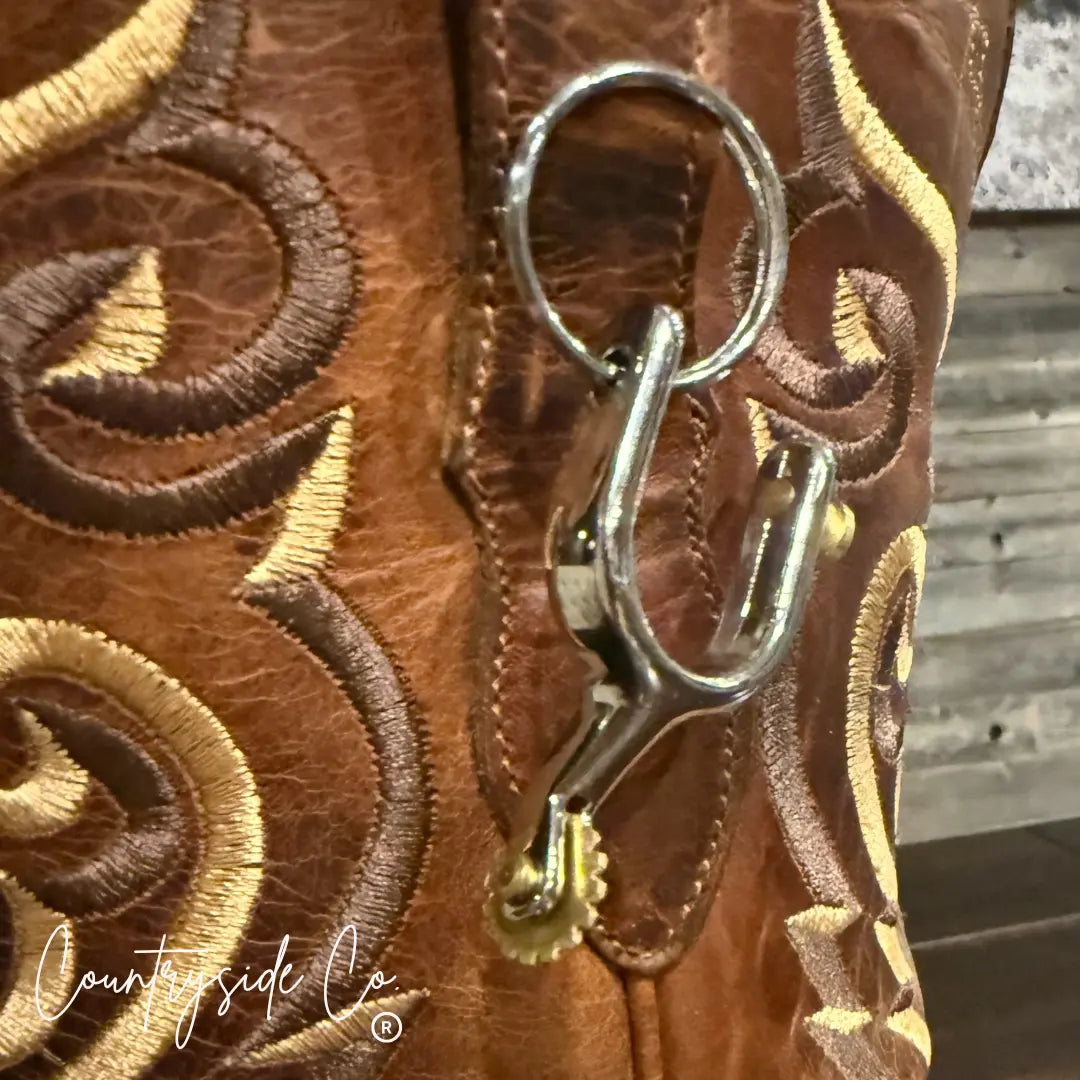 Brown leather cowboy boot with embroidered detail and a silver spur keychain