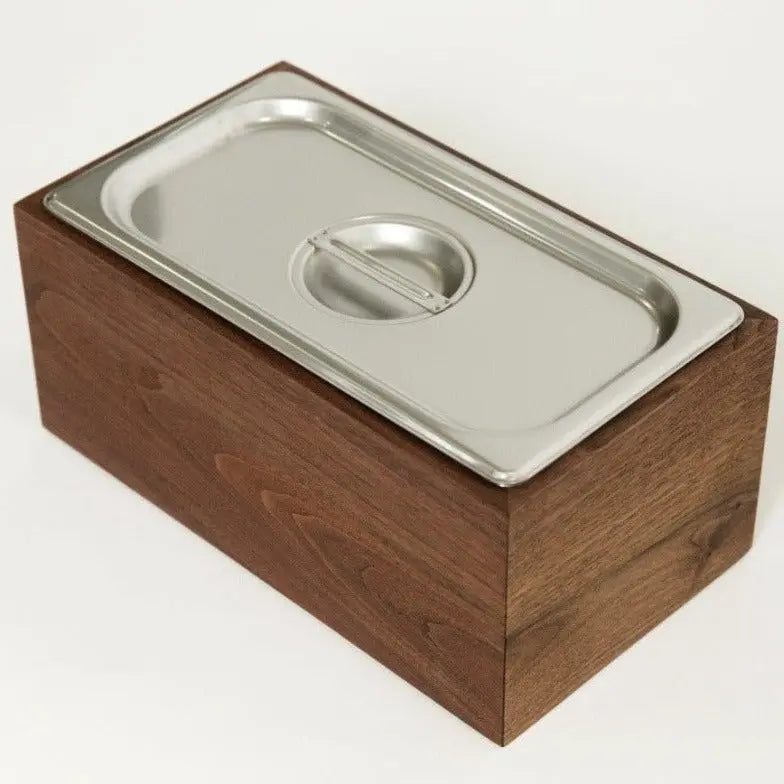 Countertop compost bin: Walnut wood box with stainless steel bin and lid for kitchen waste.