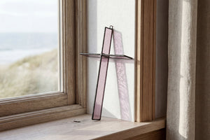 Light passing through Bottle Green Cross Suncatcher by Greyhouse Glass