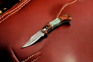 Custom Handmade Damascus Pocket Knife – Epoxy Resin Handle by Damascus Knife Store, Damascus knife detail photo 2