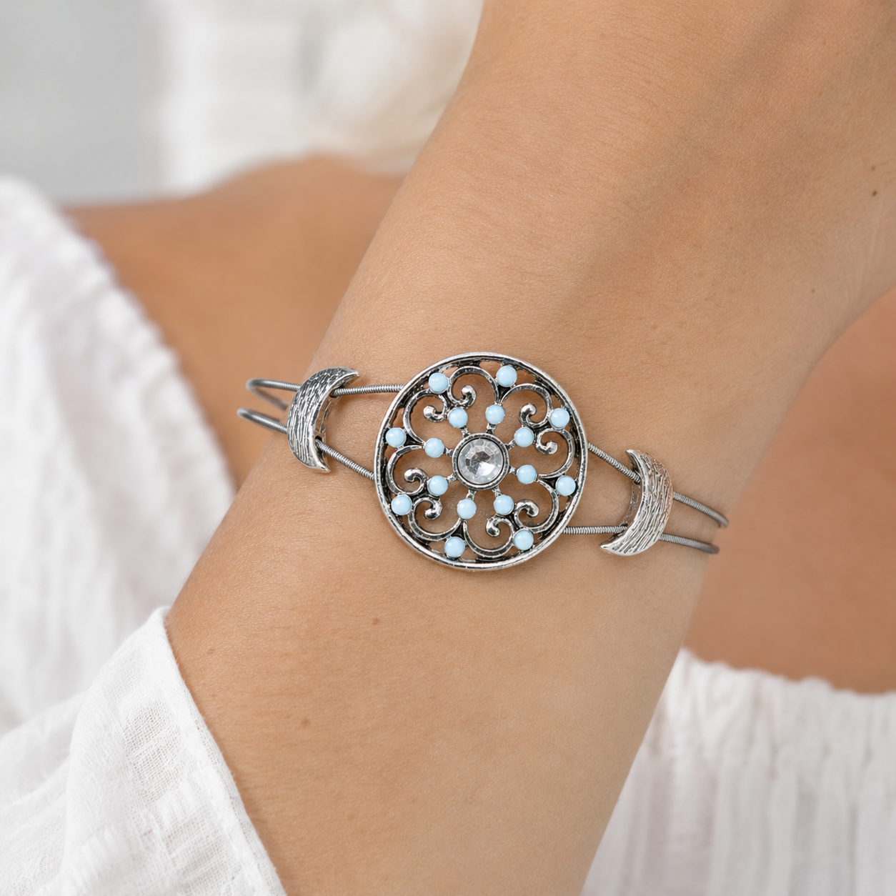 Light blue and silver guitar string bracelet