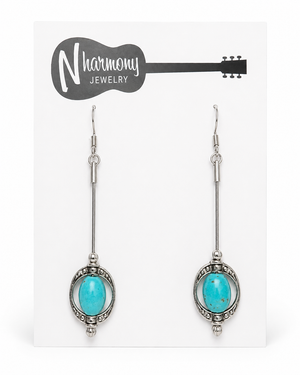 Turquoise earrings on a 'N Harmony Jewelry' branded card
