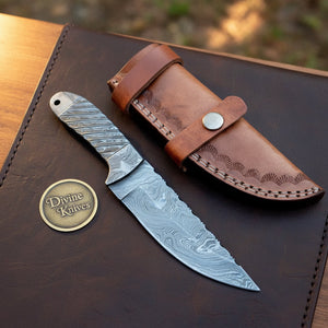 Skeleton Handle Skinning Knife with One Piece Forged Body and Fan Stamped Leather Sheath