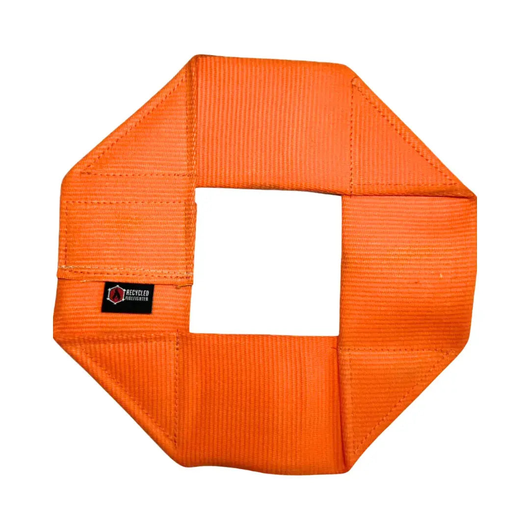 Orange fire hose dog frisbee with a square opening, featuring a "Recycled Firefighter" label.
