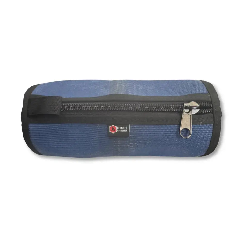 Blue fabric toiletry bag with a zipper and a small "Recycled Firefighter" logo.