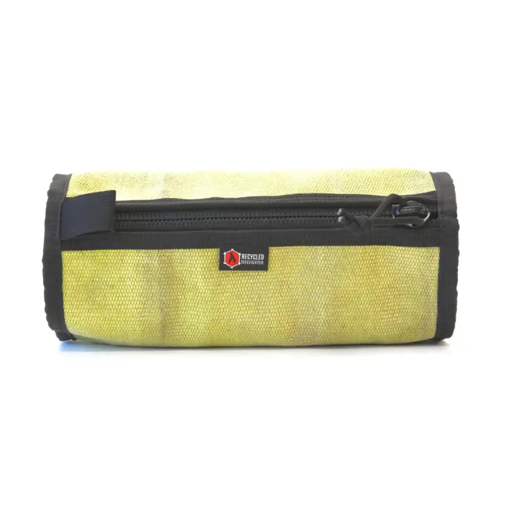 Yellow fire hose dopp kit toiletry bag with black zipper and logo.