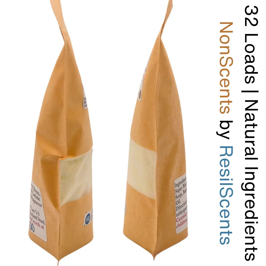 Two brown paper bags of laundry detergent with natural ingredients. See-through window shows powder. Bags by ResilScents. 