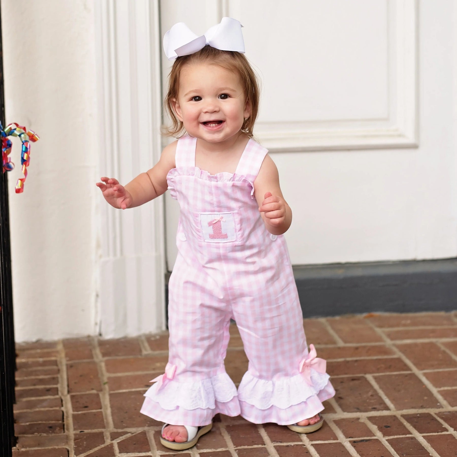 Girls Smocked First Birthday Longall by Seven Lantern Lane, children's boutique clothing detail photo 3