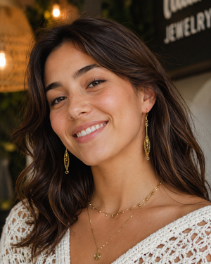 Woman wearing gold jewelry in a casual setting