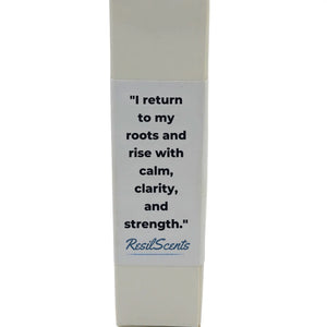 ResilScents GROUNDED roll-on oil package with the quote "I return to my roots..." written on the packaging.